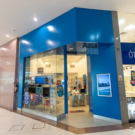 Logo da loja azul viagens