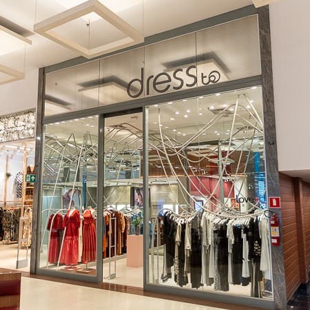 Logo da loja dress to