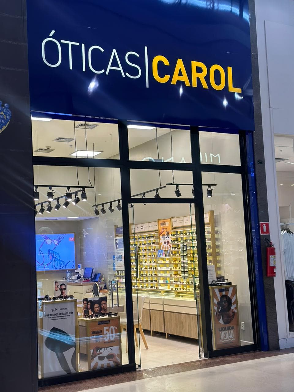 Logo da loja oticas carol